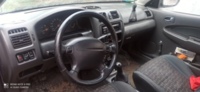 Mazda 323 BA, 1997 г.