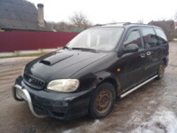 Kia Carnival I, 7 мест, 2001 г.