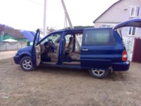 Kia Carnival I, 7 мест, 2000 г.