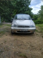 Kia Carnival I, 7 мест, 1999 г.