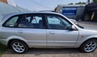 Mazda 323 BJ · Рестайлинг, 2000 г.