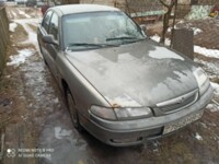 Mazda 626 GE, 1997 г.