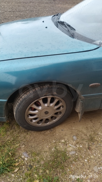 Mazda 626 GE, 1994 г.