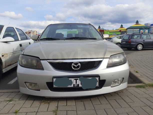 Mazda 323 BJ · Рестайлинг, 2003 г.