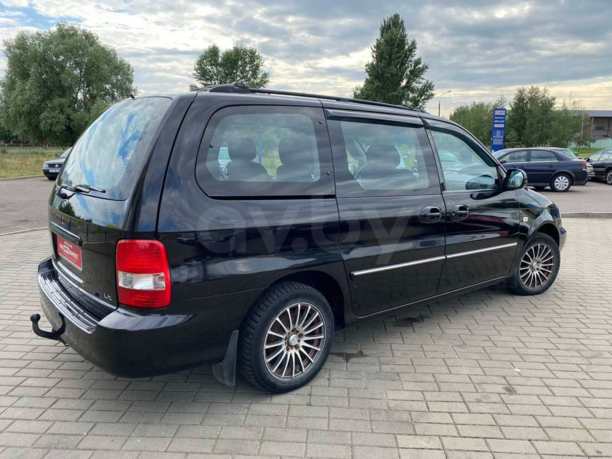 Kia Carnival I · Рестайлинг, 2003 г.
