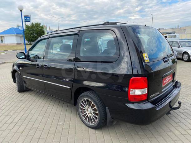 Kia Carnival I · Рестайлинг, 2003 г.