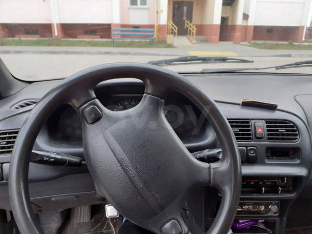 Mazda 323 BA, 1995 г.