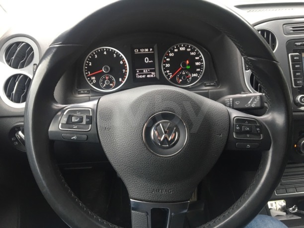 Volkswagen Tiguan I · Рестайлинг, 2014 г.
