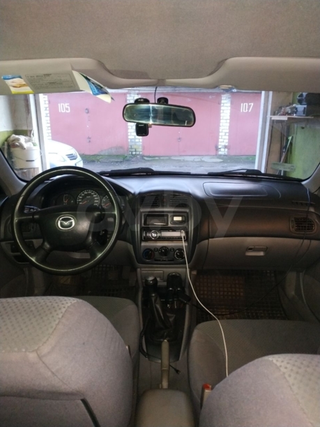 Mazda 323F, 2002 г.