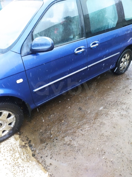 Kia Carnival I · Рестайлинг, 2002 г.