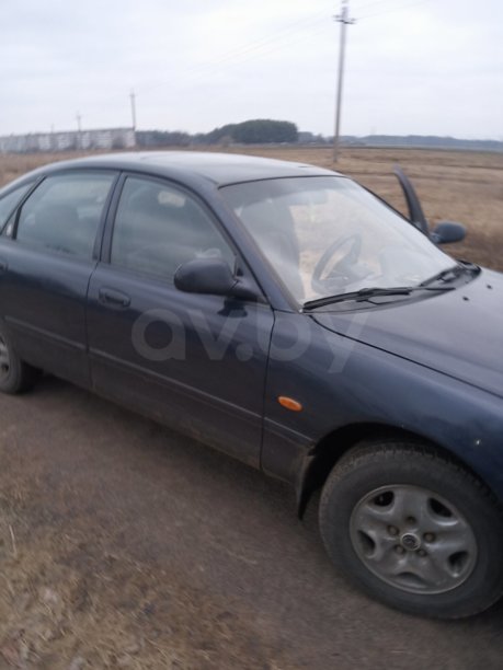 Mazda 626 GE, 1997 г.