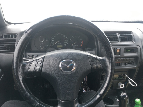 Mazda 323F, 1996 г.