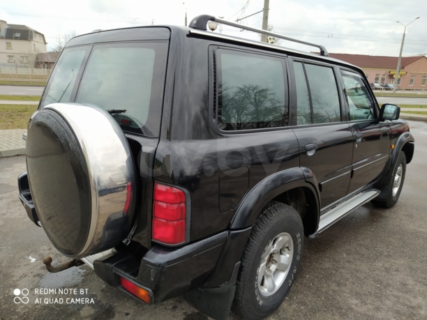 Nissan Patrol Y61, 7 мест, 2000 г.