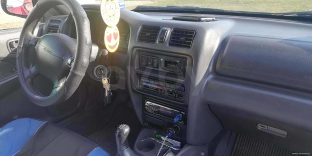 Mazda 323 BA, 1997 г.
