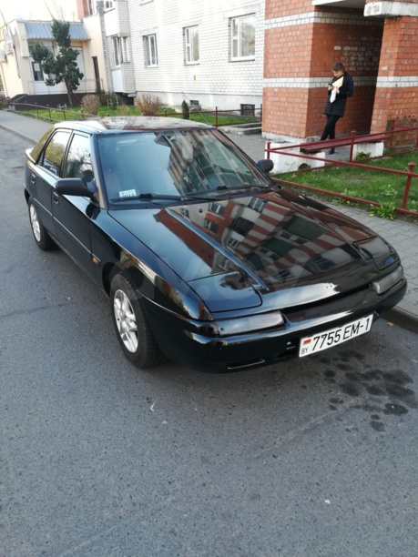 Mazda 323F, 1994 г.