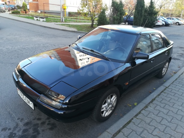 Mazda 323F, 1994 г.