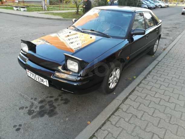 Mazda 323F, 1994 г.