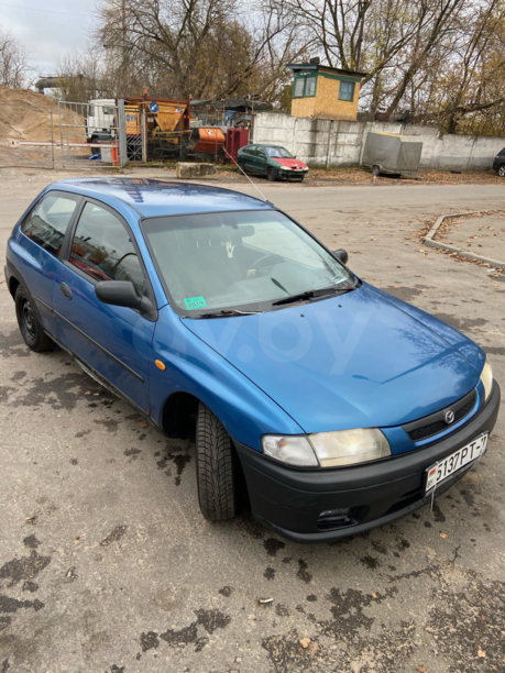 Mazda 323 BA, 1997 г.