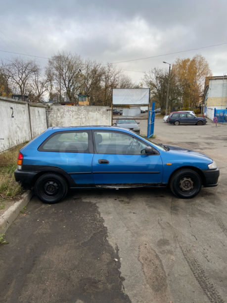 Mazda 323 BA, 1997 г.