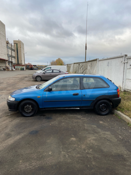 Mazda 323 BA, 1997 г.