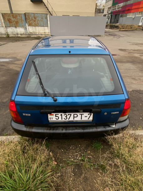 Mazda 323 BA, 1997 г.