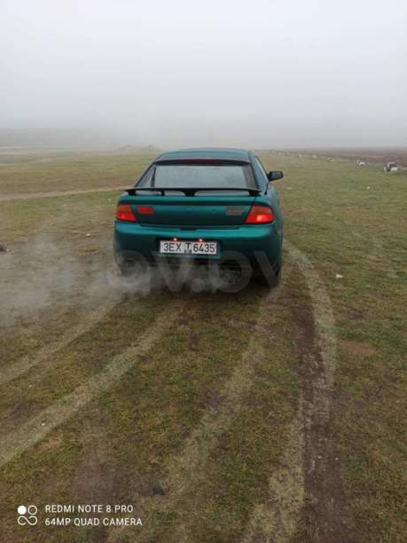 Mazda 323F, 1995 г.
