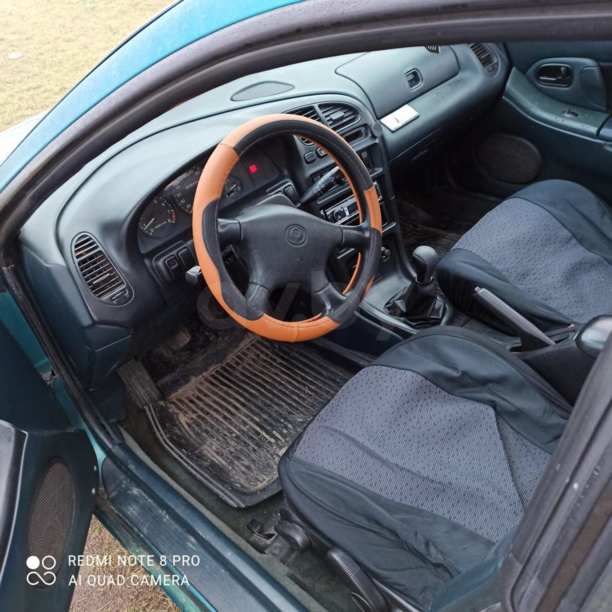 Mazda 323F, 1995 г.