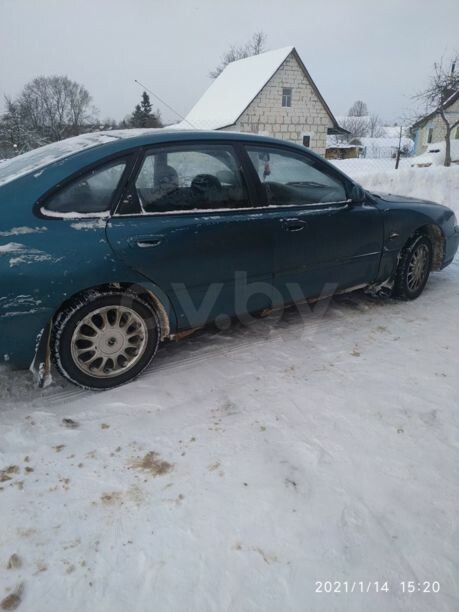 Mazda 626 GE, 1994 г.