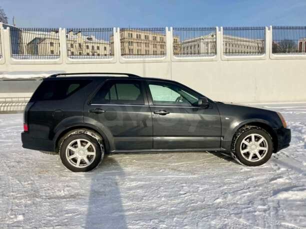 Cadillac SRX I, 5 мест, 2004 г.