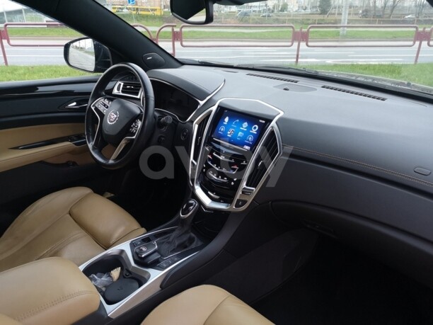 Cadillac SRX II · Рестайлинг, 5 мест, 2015 г.
