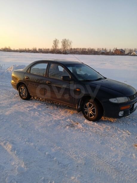 Mazda 323 BA, 1995 г.