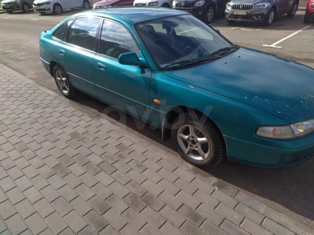 Mazda 626 GE, 1996 г.