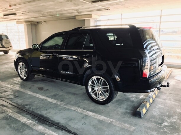 Cadillac SRX I, 5 мест, 2008 г.