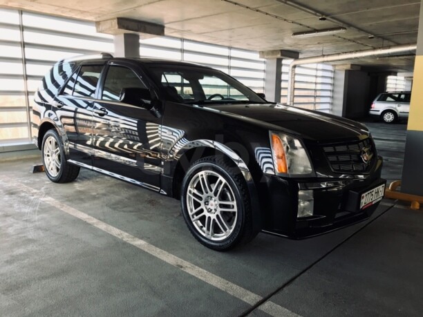 Cadillac SRX I, 5 мест, 2008 г.