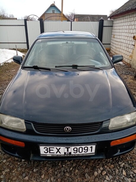 Mazda 323 BA, 1995 г.