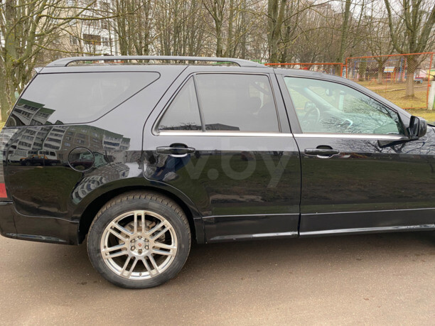 Cadillac SRX I, 5 мест, 2007 г.