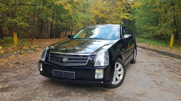 Cadillac SRX I, 7 мест, 2008 г.