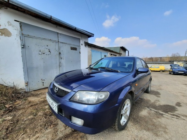 Mazda 323F, 2002 г.