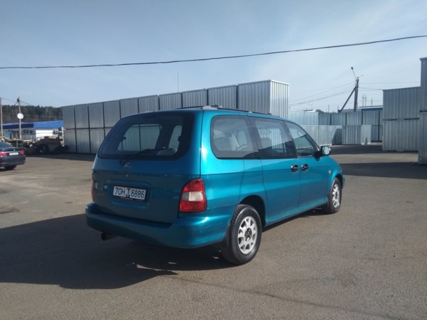 Kia Carnival I, 7 мест, 2000 г.