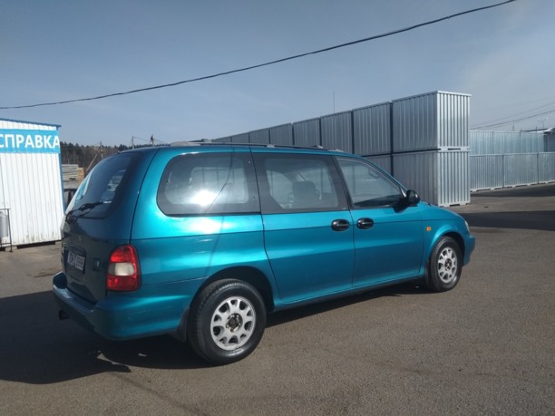 Kia Carnival I, 7 мест, 2000 г.