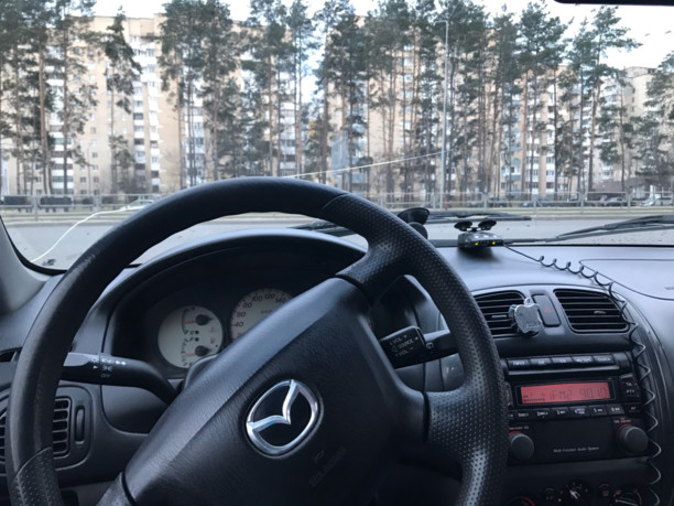 Mazda 323F, 2002 г.