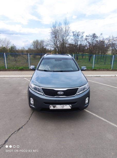 Kia Sorento II · Рестайлинг, 5 мест, 2014 г.