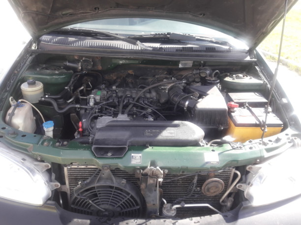 Kia Carnival I, 7 мест, 2000 г.