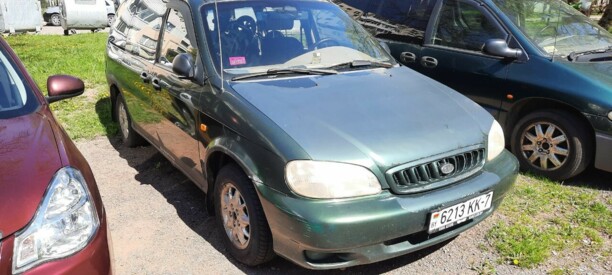 Kia Carnival I, 7 мест, 2001 г.