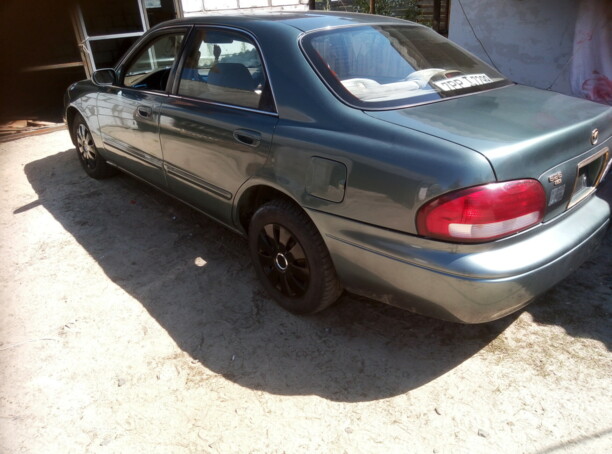 Mazda 626 GF, 1997 г.