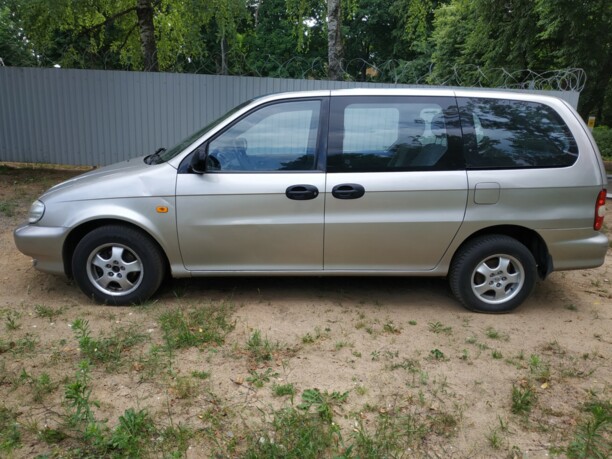 Kia Carnival I, 7 мест, 1999 г.