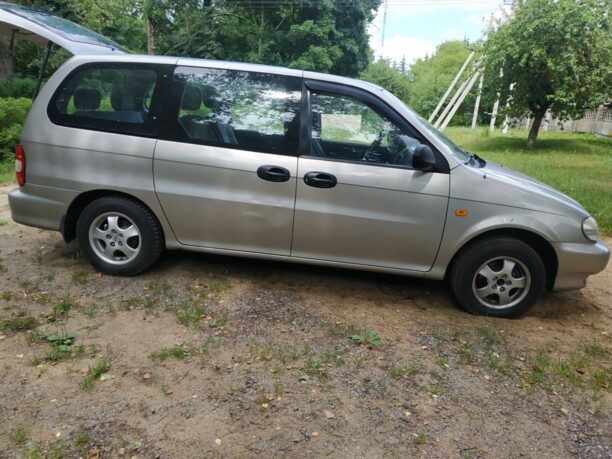 Kia Carnival I, 7 мест, 1999 г.