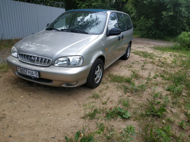Kia Carnival I, 7 мест, 1999 г.