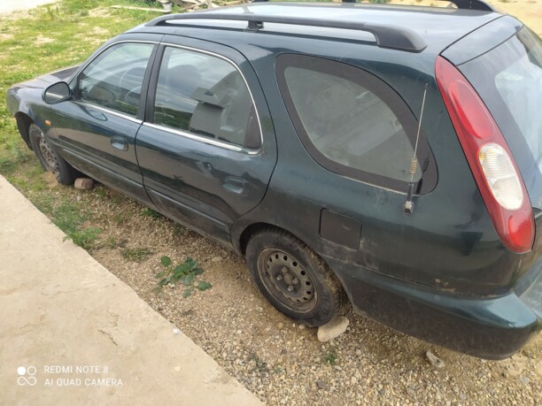 Kia Clarus I · Рестайлинг, 1999 г.