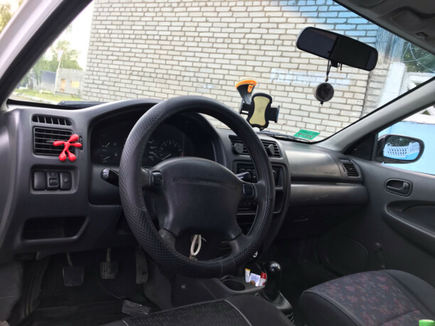 Mazda 323 BA, 1997 г.